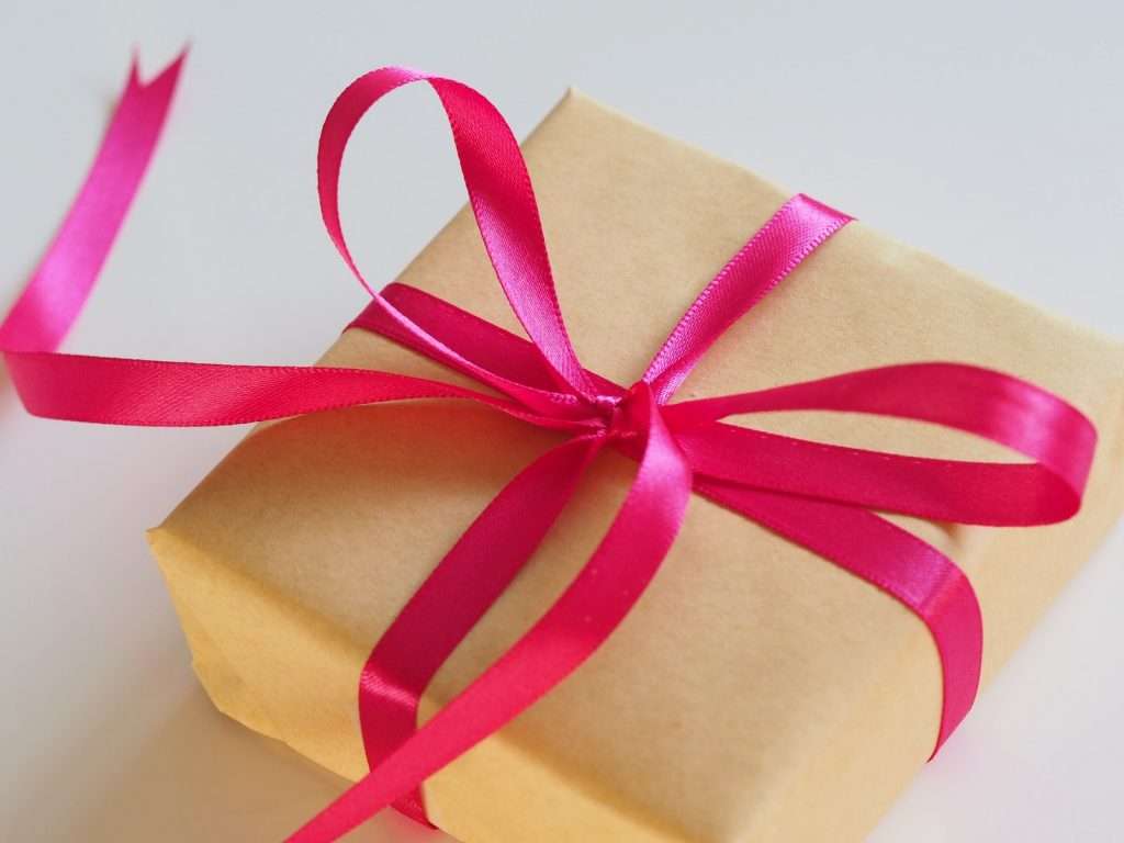 brown box gifts for grandma with pink ribbon